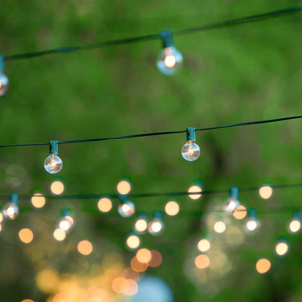 Outdoor 25 ft. Plug-In Globe Bulb Weatherproof Party String Lights with 30 G40 Bulbs Included (5 Free Bulbs), Green Cord by Newhouse Lighting 3 Outdoor 25 ft. Plug-In Globe Bulb Weatherproof Party String Lights with 30 G40 Bulbs Included (5 Free Bulbs), Green Cord by Newhouse Lighting - Image 2